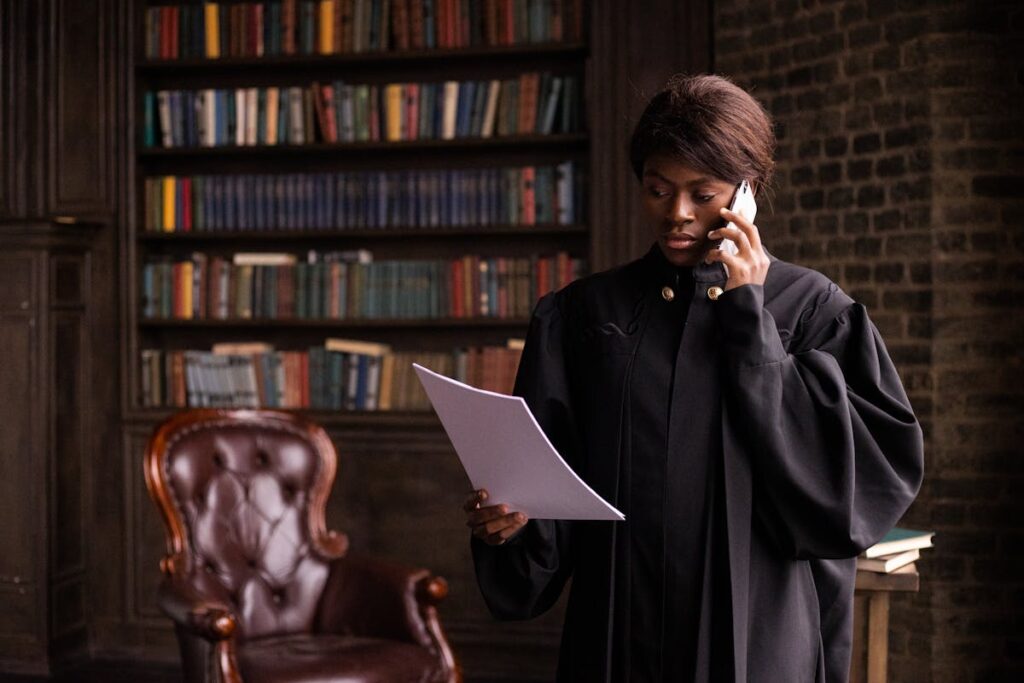 A Judge Reading a Document while Having a Phone Call