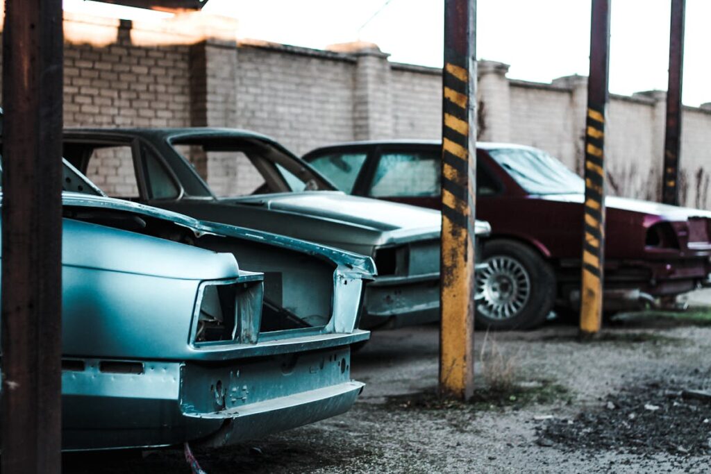 Broken cars on parking lot