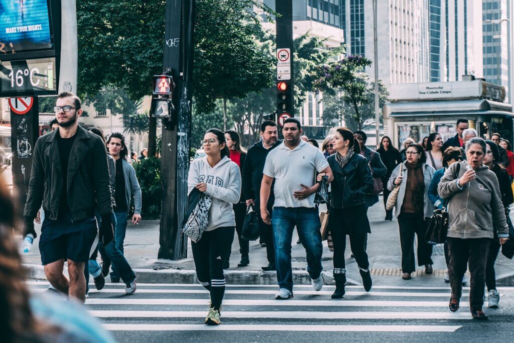 People Walking on Pedestrian Lane during Daytime