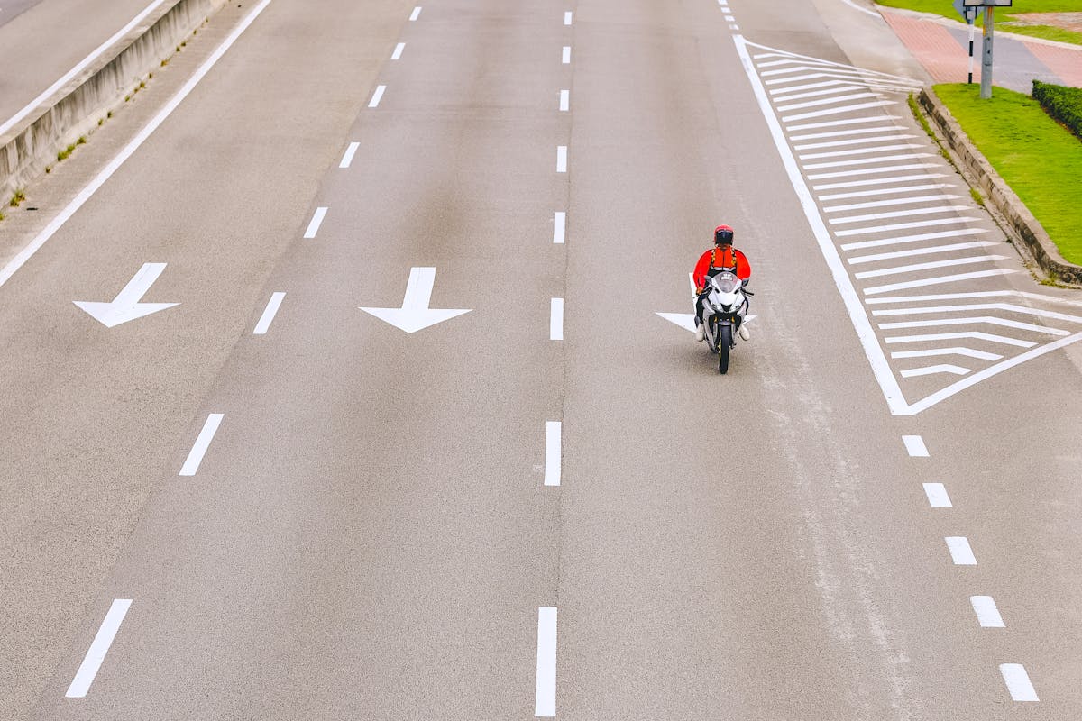 Man Driving a Motorcycle