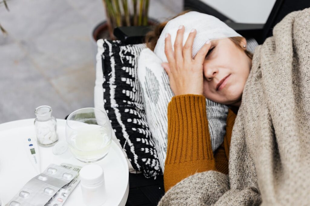 Woman with Head Bandage Lying on a Couch