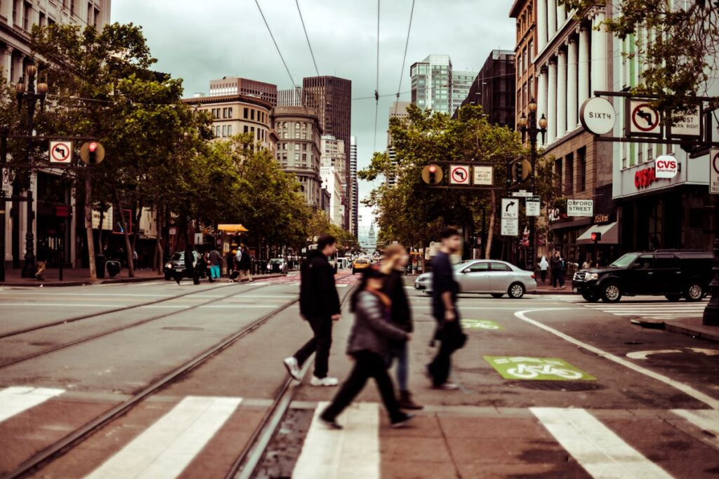 Several People Crossing the Road